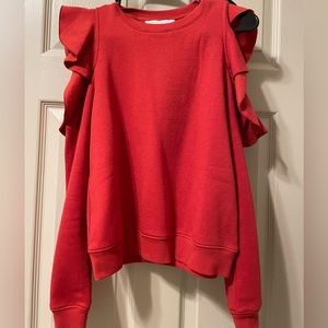 Rebecca mink off red sweater